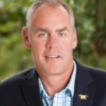 Retired Navy SEAL and U.S. Representative Ryan Zinke giving a testimonial for Chris Sajnog.